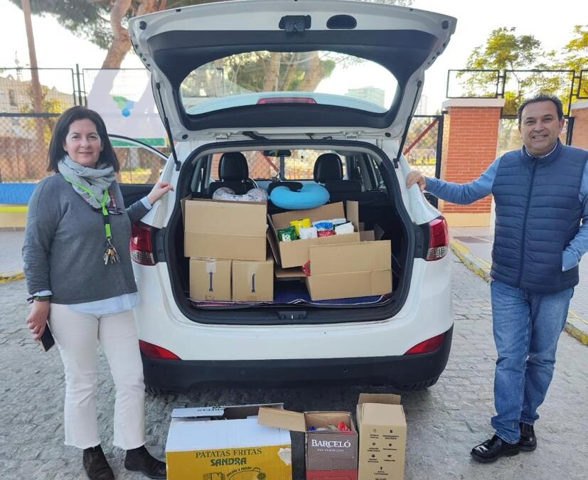 Entrega de alimentos a Cáritas del Pilar